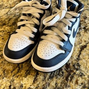 Navy and white Nike air Jordan kids shoes size 10.5